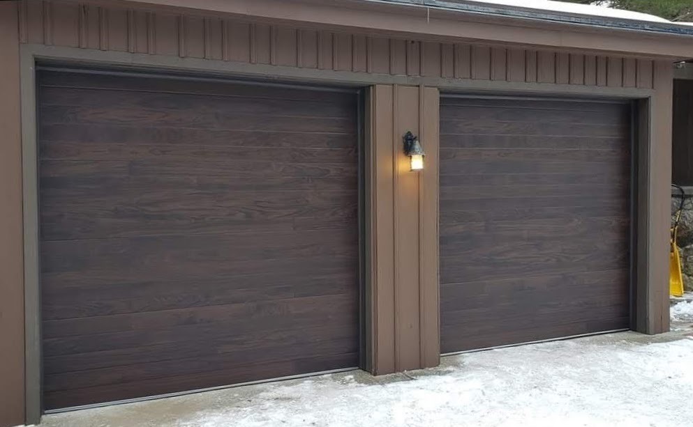Flushed Panel Faux Wood Garage Doors in Mahogany